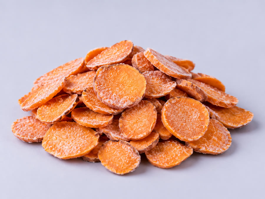 Frozen sweet potato chips with ice crystals