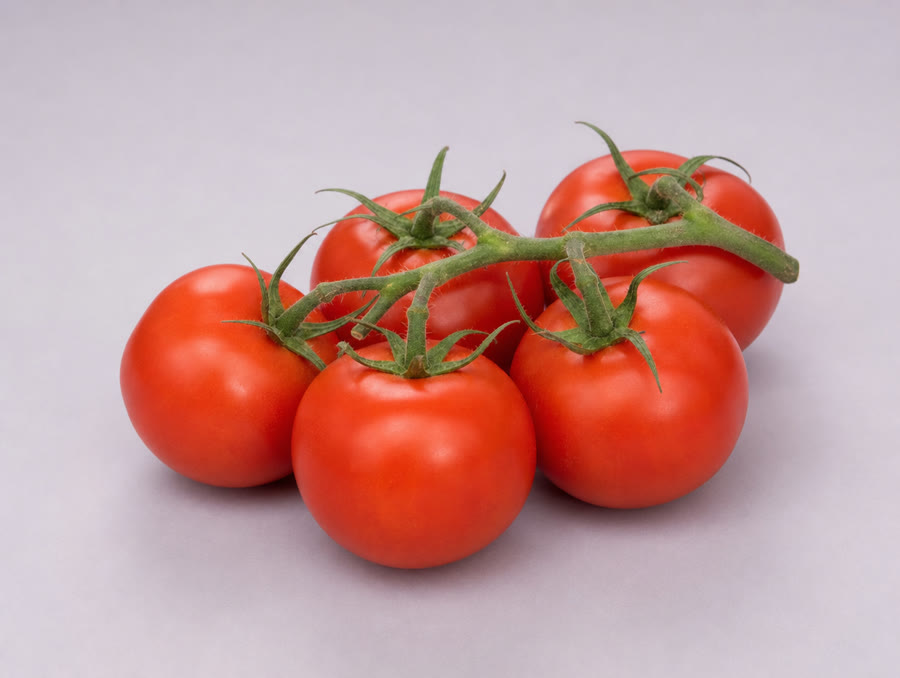 Whole tomatoes on the vine